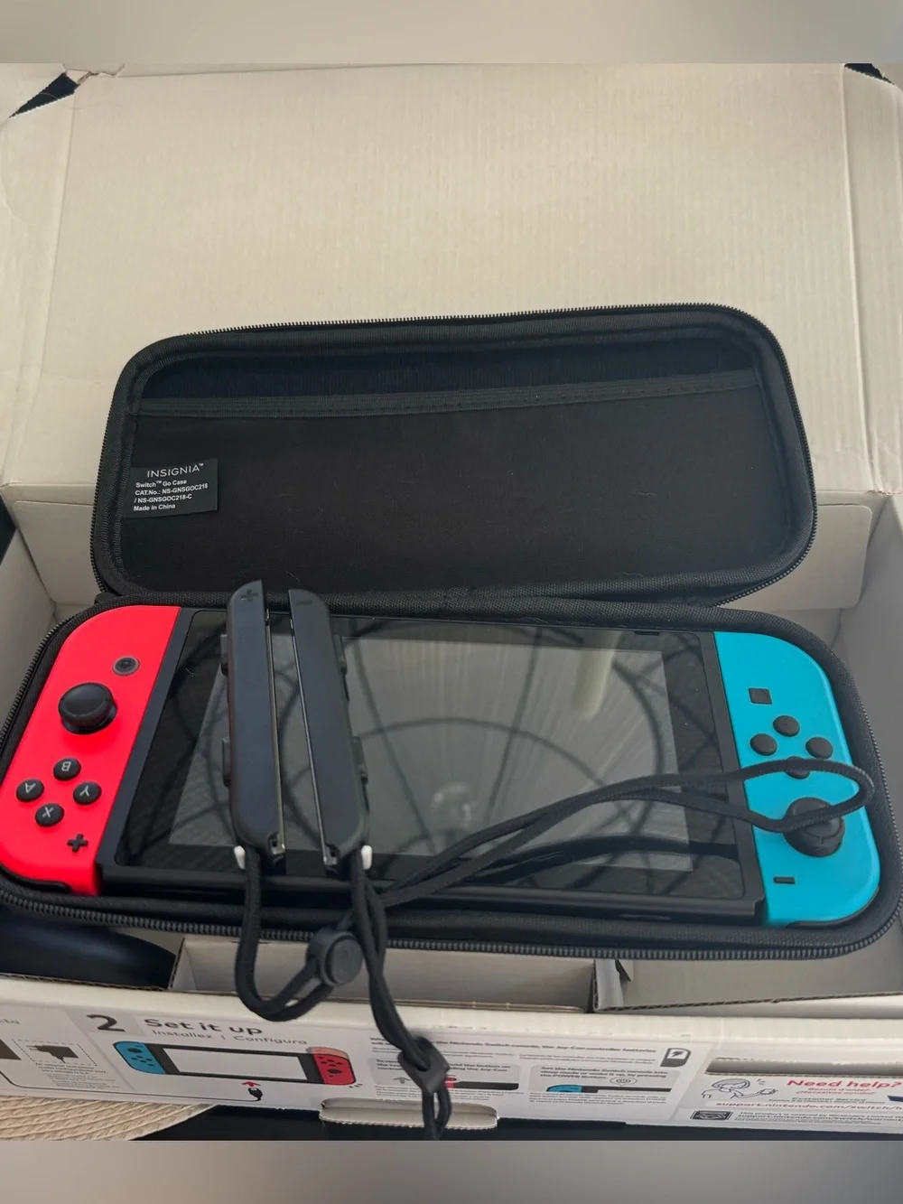 Nintendo Switch with Red and Blue Joy‑Con and Carry Case Not used much!